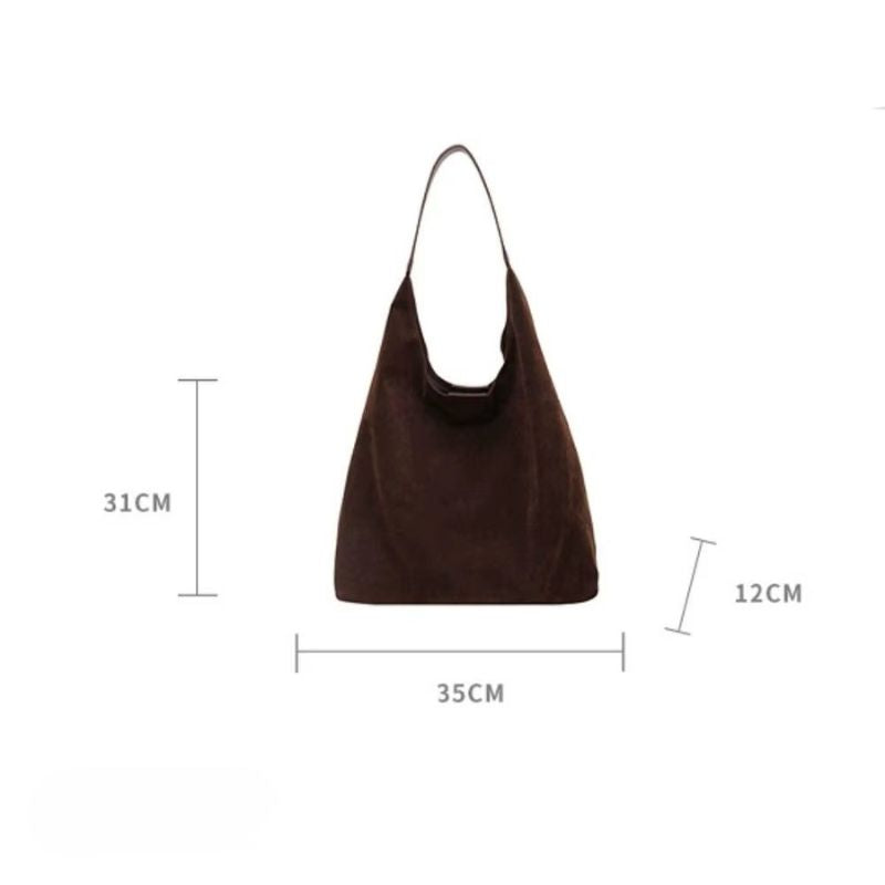 bolsa feminina camurça, bolsa suede feminina, bolsa feminina tipo saco, bolsa feminina de ombro, bolsa feminina grande camurça, bolsa feminina estilo minimalista, bolsa feminina moderna, bolsa feminina elegante, bolsa feminina casual, bolsa feminina macia, bolsa feminina leve, bolsa feminina marrom, bolsa feminina preta