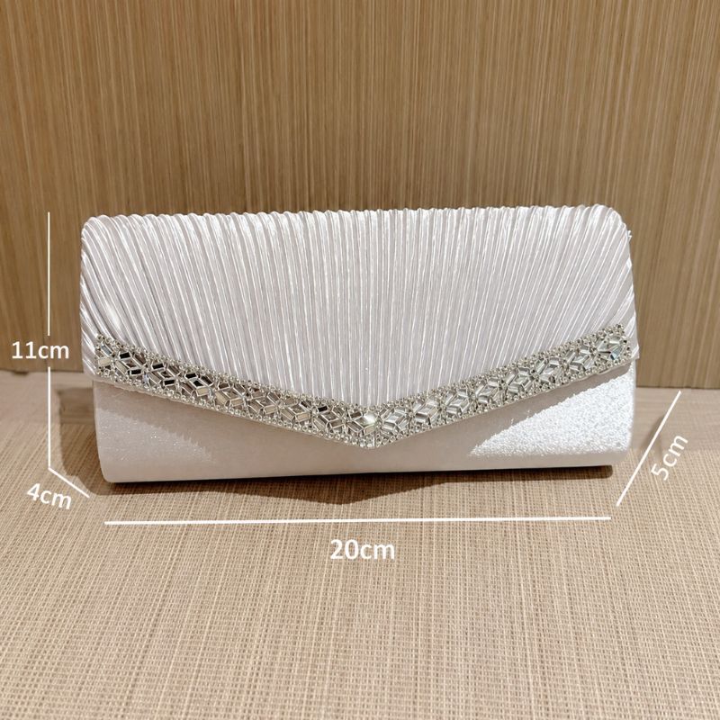 bolsa feminina clutch Gisele, bolsa clutch feminina, clutch feminina, bolsa clutch para festa, bolsa feminina para festa, bolsa de festa feminina, bolsa para casamento, bolsa feminina para casamento, clutch para casamento, bolsa para formatura, clutch para formatura, bolsa feminina para formatura, bolsa pequena para festa, bolsa feminina pequena, bolsa feminina com brilho, bolsa brilhante feminina, clutch com brilho, bolsa de mão feminina, bolsa de mão para festa, bolsa tiracolo para festa, clutch tiracolo,