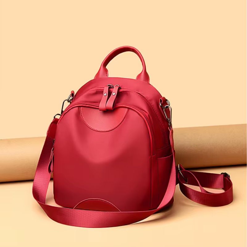 mochila feminina pequena nylon, mochila feminina pequena, mochila feminina leve, mochila feminina compacta, mochila feminina dia a dia, mochila feminina moderna, mochila feminina casual, mochila feminina vermelha, mochila feminina preta, mochila feminina prática, mochila feminina confortável
