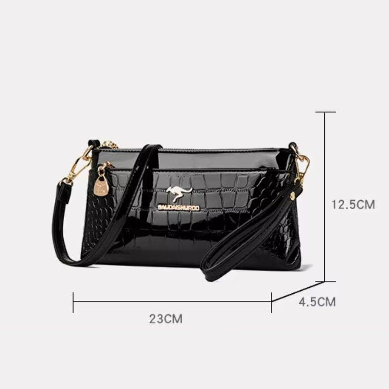 bolsa clutch feminina, bolsa feminina elegante, bolsa feminina sofisticada, bolsa crocodilo feminina, bolsa feminina envernizada, clutch feminina preta, clutch feminina azul, clutch feminina vermelha, bolsa feminina café, bolsa tiracolo feminina elegante, bolsa feminina pequena, bolsa feminina moderna, bolsa feminina premium, bolsa feminina social, clutch feminina luxo, bolsa feminina brilho, bolsa feminina compacta, bolsa feminina transversal, bolsa feminina textura crocodilo, bolsa feminina casual chic, b