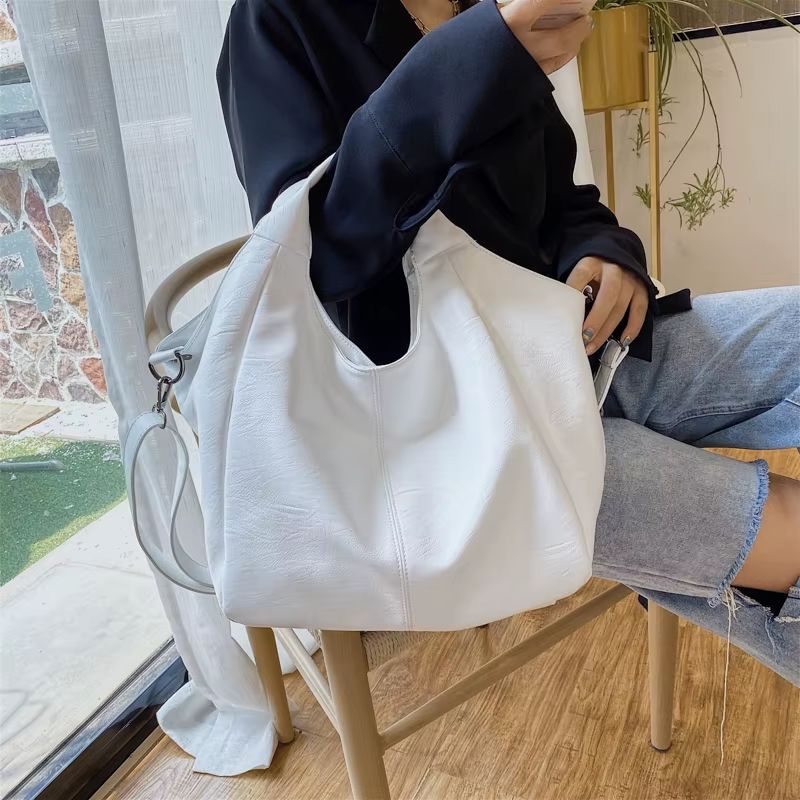 bolsa feminina tote grande, bolsa feminina grande couro macio, bolsa feminina estilo saco, bolsa feminina grande elegante, bolsa feminina tiracolo grande, bolsa feminina ombro grande, bolsa feminina espaçosa, bolsa feminina casual elegante, bolsa feminina grande dia a dia, bolsa feminina moderna grande, bolsa feminina confortável grande, bolsa feminina prática grande