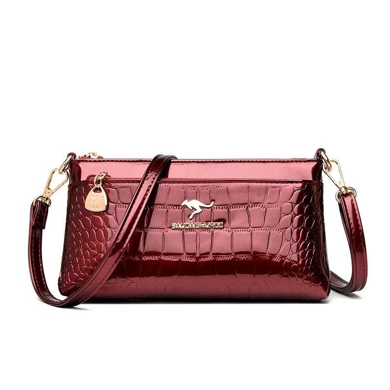 bolsa clutch feminina, bolsa feminina elegante, bolsa feminina sofisticada, bolsa crocodilo feminina, bolsa feminina envernizada, clutch feminina preta, clutch feminina azul, clutch feminina vermelha, bolsa feminina café, bolsa tiracolo feminina elegante, bolsa feminina pequena, bolsa feminina moderna, bolsa feminina premium, bolsa feminina social, clutch feminina luxo, bolsa feminina brilho, bolsa feminina compacta, bolsa feminina transversal, bolsa feminina textura crocodilo, bolsa feminina casual chic, b