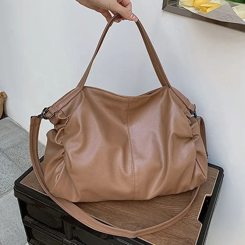 bolsa feminina grande, bolsa feminina grande Malu, bolsa Malu, bolsa feminina tiracolo, bolsa tiracolo feminina, bolsa tiracolo grande, bolsa feminina grande tiracolo, bolsa tote feminina, bolsa tote grande, bolsa feminina tote, bolsa tipo saco feminina, bolsa saco feminina, bolsa feminina tipo saco, bolsa saco grande, bolsa feminina couro PU, bolsa couro PU feminina, bolsa grande couro PU, bolsa feminina espaçosa, bolsa grande espaçosa, bolsa feminina 43 cm, bolsa grande 43 cm, bolsa feminina para o dia a