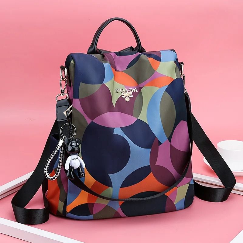 mochila feminina, mochila feminina impermeável, mochila feminina nylon, mochila feminina de nylon, mochila feminina moderna, mochila feminina estampada, mochila feminina colorida, mochila feminina floral, mochila feminina penas, mochila feminina antifurto, mochila feminina abertura traseira, mochila feminina segura, mochila feminina grande, mochila feminina espaçosa, mochila feminina para trabalho, mochila feminina para faculdade, mochila feminina para viagem, mochila feminina elegante, mochila feminina cas