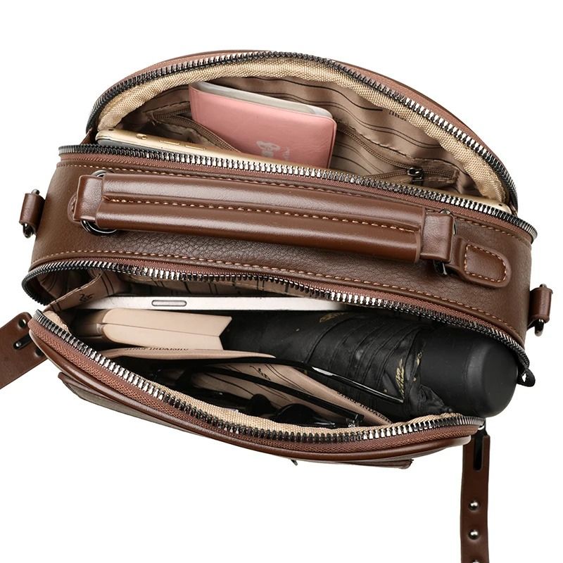 bolsa feminina tiracolo Jessica, bolsa feminina estruturada, bolsa feminina pequena, bolsa feminina média, bolsa feminina couro ecológico, bolsa feminina elegante, bolsa feminina moderna, bolsa feminina tiracolo premium, bolsa feminina com alça de mão, bolsa feminina com alça ajustável, bolsa feminina casual chic, bolsa feminina para trabalho, bolsa feminina para escritório, bolsa feminina para passeio, bolsa feminina organizada, bolsa feminina com dois compartimentos, bolsa feminina com bolso frontal, bols