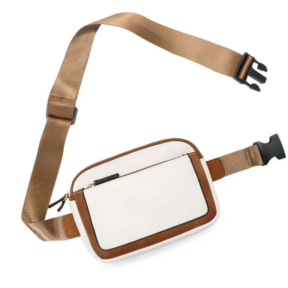 Bolsa Feminina Tipo Pochete Julia compacta, moderna e prática. Modelo transversal com alça ajustável, perfeita para o dia a dia, viagens e passeios.