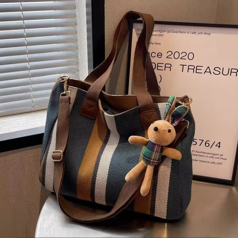 bolsa feminina, bolsa feminina Mel, bolsa Mel, bolsa feminina tipo sacola, bolsa tipo sacola feminina, bolsa sacola feminina, bolsa feminina de tecido, bolsa de tecido feminina, bolsa feminina listrada, bolsa listrada feminina, bolsa de tecido listrada, bolsa feminina tamanho médio, bolsa feminina média, bolsa média feminina, bolsa feminina média espaçosa, bolsa feminina 38 cm, bolsa feminina 38x28, bolsa feminina 38x28x11, bolsa feminina de ombro, bolsa de ombro feminina, bolsa feminina com alça longa, bol