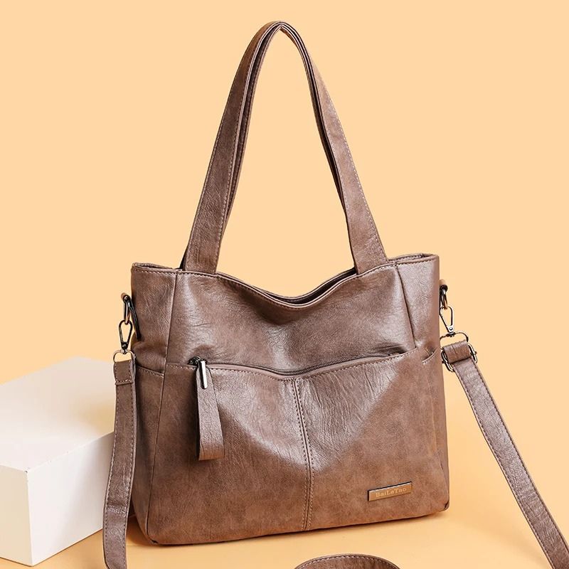 bolsa feminina tiracolo, bolsa feminina Silmara, bolsa feminina média, bolsa feminina couro ecológico, bolsa feminina couro PU, bolsa feminina elegante, bolsa feminina moderna, bolsa feminina ombro, bolsa feminina transversal, bolsa feminina casual, bolsa feminina premium, bolsa feminina espaçosa, bolsa feminina para trabalho, bolsa feminina para passeio, bolsa feminina para viagem, bolsa feminina com bolso frontal, bolsa feminina com zíper, bolsa feminina confortável, bolsa feminina prática, bolsa feminina