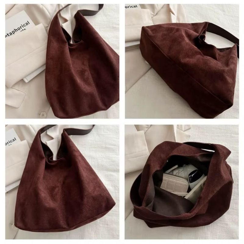 bolsa feminina camurça, bolsa suede feminina, bolsa feminina tipo saco, bolsa feminina de ombro, bolsa feminina grande camurça, bolsa feminina estilo minimalista, bolsa feminina moderna, bolsa feminina elegante, bolsa feminina casual, bolsa feminina macia, bolsa feminina leve, bolsa feminina marrom, bolsa feminina preta