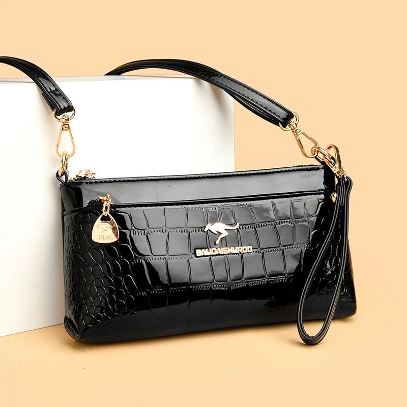 bolsa clutch feminina, bolsa feminina elegante, bolsa feminina sofisticada, bolsa crocodilo feminina, bolsa feminina envernizada, clutch feminina preta, clutch feminina azul, clutch feminina vermelha, bolsa feminina café, bolsa tiracolo feminina elegante, bolsa feminina pequena, bolsa feminina moderna, bolsa feminina premium, bolsa feminina social, clutch feminina luxo, bolsa feminina brilho, bolsa feminina compacta, bolsa feminina transversal, bolsa feminina textura crocodilo, bolsa feminina casual chic, b