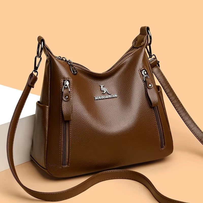 bolsa feminina tiracolo maitê, bolsa feminina tiracolo, bolsa feminina elegante, bolsa feminina clássica, bolsa feminina média, bolsa feminina de ombro, bolsa feminina sofisticada, bolsa feminina moderna, bolsa feminina casual elegante, bolsa feminina couro ecológico, bolsa feminina premium, bolsa feminina para trabalho, bolsa feminina para passeio, bolsa feminina para viagem, bolsa feminina versátil, bolsa feminina com zíper, bolsa feminina organizada, bolsa feminina espaçosa, bolsa feminina marrom, bolsa 