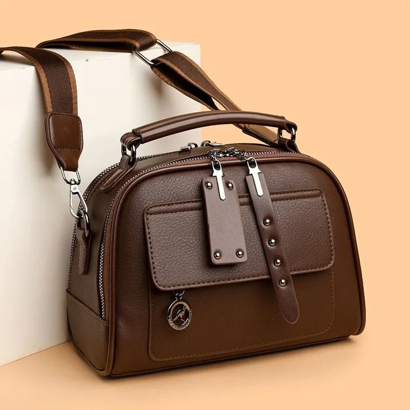 bolsa feminina tiracolo Jessica, bolsa feminina estruturada, bolsa feminina pequena, bolsa feminina média, bolsa feminina couro ecológico, bolsa feminina elegante, bolsa feminina moderna, bolsa feminina tiracolo premium, bolsa feminina com alça de mão, bolsa feminina com alça ajustável, bolsa feminina casual chic, bolsa feminina para trabalho, bolsa feminina para escritório, bolsa feminina para passeio, bolsa feminina organizada, bolsa feminina com dois compartimentos, bolsa feminina com bolso frontal, bols