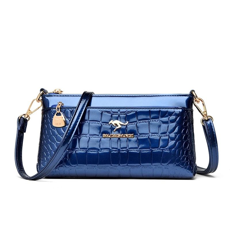 bolsa clutch feminina, bolsa feminina elegante, bolsa feminina sofisticada, bolsa crocodilo feminina, bolsa feminina envernizada, clutch feminina preta, clutch feminina azul, clutch feminina vermelha, bolsa feminina café, bolsa tiracolo feminina elegante, bolsa feminina pequena, bolsa feminina moderna, bolsa feminina premium, bolsa feminina social, clutch feminina luxo, bolsa feminina brilho, bolsa feminina compacta, bolsa feminina transversal, bolsa feminina textura crocodilo, bolsa feminina casual chic, b