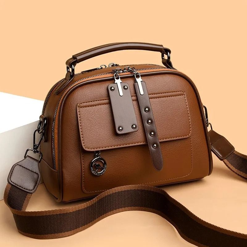bolsa feminina tiracolo Jessica, bolsa feminina estruturada, bolsa feminina pequena, bolsa feminina média, bolsa feminina couro ecológico, bolsa feminina elegante, bolsa feminina moderna, bolsa feminina tiracolo premium, bolsa feminina com alça de mão, bolsa feminina com alça ajustável, bolsa feminina casual chic, bolsa feminina para trabalho, bolsa feminina para escritório, bolsa feminina para passeio, bolsa feminina organizada, bolsa feminina com dois compartimentos, bolsa feminina com bolso frontal, bols