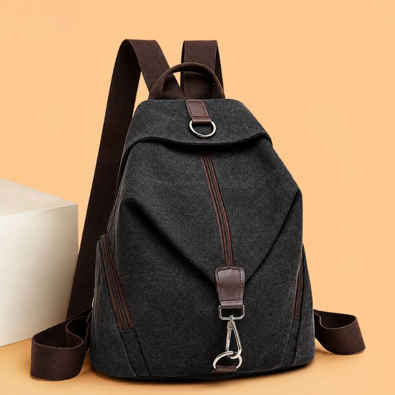 mochila feminina de lona, mochila feminina Jaqueline, mochila feminina casual, mochila feminina moderna, mochila feminina resistente, mochila feminina lona premium, mochila feminina urbana, mochila feminina para trabalho, mochila feminina para faculdade, mochila feminina para passeio, mochila feminina para viagem, mochila feminina elegante, mochila feminina com bolso traseiro, mochila feminina com bolsos laterais, mochila feminina com zíper, mochila feminina segura, mochila feminina compacta, mochila femini