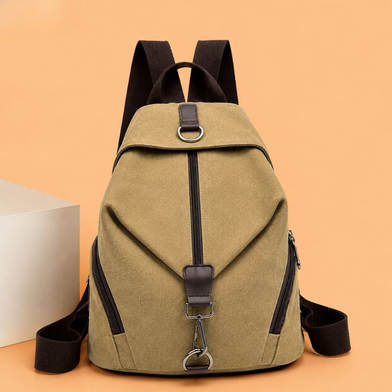 mochila feminina de lona, mochila feminina Jaqueline, mochila feminina casual, mochila feminina moderna, mochila feminina resistente, mochila feminina lona premium, mochila feminina urbana, mochila feminina para trabalho, mochila feminina para faculdade, mochila feminina para passeio, mochila feminina para viagem, mochila feminina elegante, mochila feminina com bolso traseiro, mochila feminina com bolsos laterais, mochila feminina com zíper, mochila feminina segura, mochila feminina compacta, mochila femini