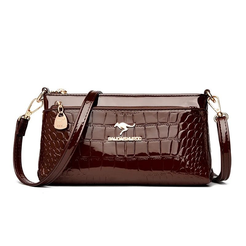 bolsa clutch feminina, bolsa feminina elegante, bolsa feminina sofisticada, bolsa crocodilo feminina, bolsa feminina envernizada, clutch feminina preta, clutch feminina azul, clutch feminina vermelha, bolsa feminina café, bolsa tiracolo feminina elegante, bolsa feminina pequena, bolsa feminina moderna, bolsa feminina premium, bolsa feminina social, clutch feminina luxo, bolsa feminina brilho, bolsa feminina compacta, bolsa feminina transversal, bolsa feminina textura crocodilo, bolsa feminina casual chic, b