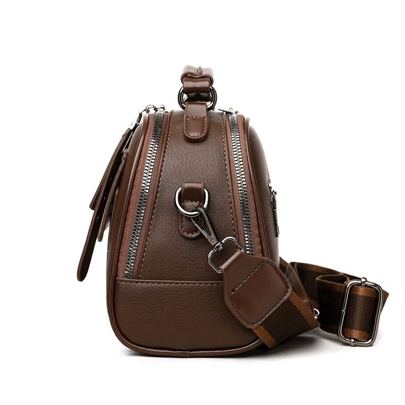 bolsa feminina tiracolo Jessica, bolsa feminina estruturada, bolsa feminina pequena, bolsa feminina média, bolsa feminina couro ecológico, bolsa feminina elegante, bolsa feminina moderna, bolsa feminina tiracolo premium, bolsa feminina com alça de mão, bolsa feminina com alça ajustável, bolsa feminina casual chic, bolsa feminina para trabalho, bolsa feminina para escritório, bolsa feminina para passeio, bolsa feminina organizada, bolsa feminina com dois compartimentos, bolsa feminina com bolso frontal, bols