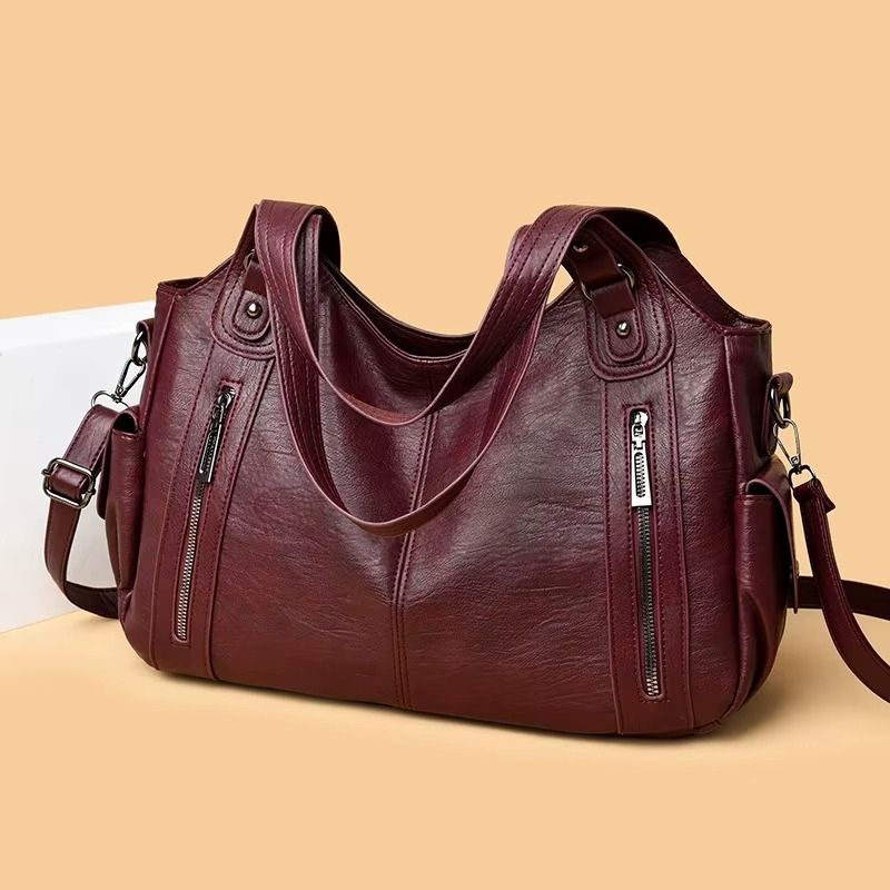 bolsa feminina grande tiracolo, bolsa feminina grande com bolsos, bolsa feminina couro macio grande, bolsa feminina espaçosa, bolsa feminina organizada, bolsa feminina prática grande, bolsa feminina dia a dia grande, bolsa feminina ombro grande, bolsa feminina funcional, bolsa feminina moderna grande, bolsa feminina com ziper, bolsa feminina elegante grande