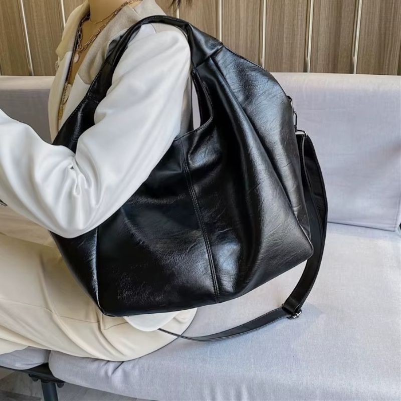 bolsa feminina tote grande, bolsa feminina grande couro macio, bolsa feminina estilo saco, bolsa feminina grande elegante, bolsa feminina tiracolo grande, bolsa feminina ombro grande, bolsa feminina espaçosa, bolsa feminina casual elegante, bolsa feminina grande dia a dia, bolsa feminina moderna grande, bolsa feminina confortável grande, bolsa feminina prática grande
