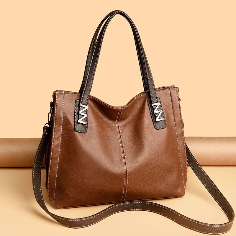 bolsa feminina grande, bolsa feminina tiracolo, bolsa feminina berlim, bolsa feminina couro ecológico, bolsa feminina couro PU, bolsa feminina grande couro ecológico, bolsa feminina ombro, bolsa feminina transversal, bolsa feminina elegante, bolsa feminina moderna, bolsa feminina premium, bolsa feminina espaçosa, bolsa feminina para trabalho, bolsa feminina executiva, bolsa feminina casual, bolsa feminina fashion, bolsa feminina sofisticada, bolsa feminina grande tiracolo, bolsa feminina grande ombro, bolsa