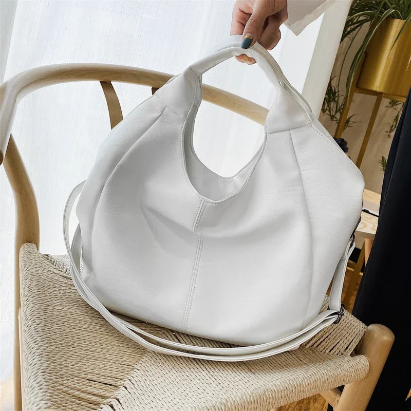bolsa feminina tote grande, bolsa feminina grande couro macio, bolsa feminina estilo saco, bolsa feminina grande elegante, bolsa feminina tiracolo grande, bolsa feminina ombro grande, bolsa feminina espaçosa, bolsa feminina casual elegante, bolsa feminina grande dia a dia, bolsa feminina moderna grande, bolsa feminina confortável grande, bolsa feminina prática grande