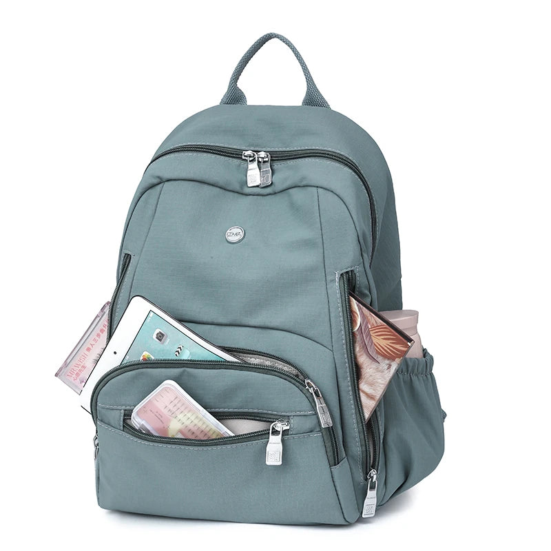 mochila feminina nylon, mochila feminina grande, mochila feminina para trabalho, mochila feminina para estudo, mochila feminina A4, mochila feminina resistente, mochila feminina leve, mochila feminina moderna, mochila feminina com divisórias, mochila feminina casual, mochila feminina confortável, mochila feminina espaçosa