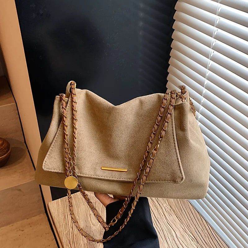 bolsa feminina suede sintético, bolsa feminina camurça, bolsa feminina tiracolo suede, bolsa feminina toque aveludado, bolsa feminina macia elegante, bolsa feminina camurça sintética, bolsa feminina confortável, bolsa feminina resistente, bolsa feminina dia a dia elegante, bolsa feminina moderna suede, bolsa feminina prática elegante, bolsa feminina estilo camurça